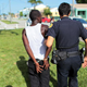 A Miami police officer makes an arrest while patrolling the streetsin August 2010. (Joe Raedle/Getty Images)